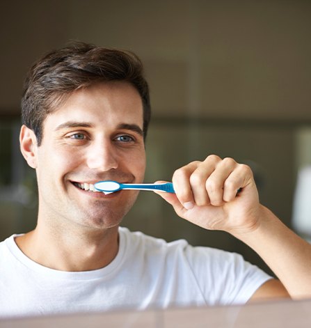 Man brushing his teeth