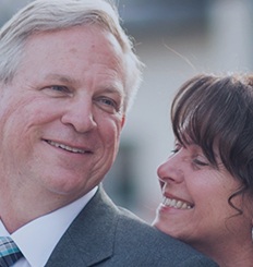 Smiling older man and woman